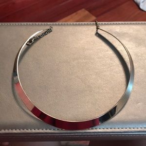 A gold hoop necklace